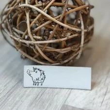 Koženkový štítek pro přišití do švu – divočák