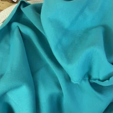 Hebká tyrkysová teplákovina 320 g/m² – kvalitní látka od Látky OLiVe.