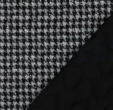 Prošívaná látka s kohoutí stopou a flitry v černobílé kombinaci