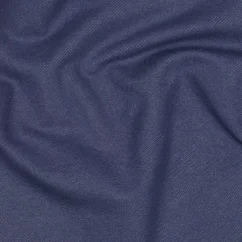 Jeans žakárový úplet v tmavě modré barvě s denim strukturou – látka vhodná na šití oblečení.