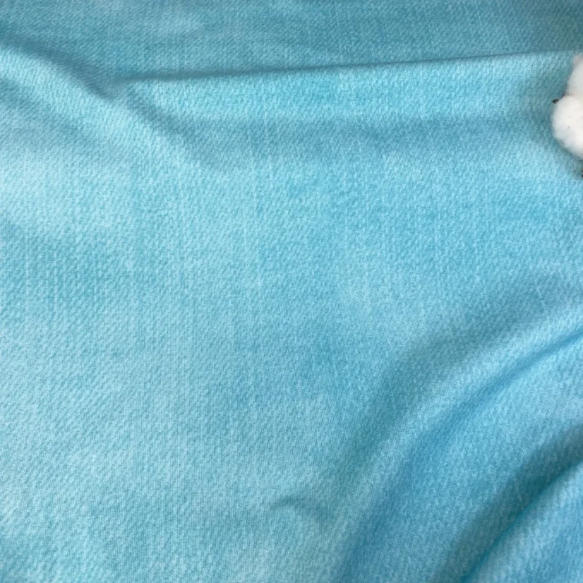 Detail bavlněného úpletu s džínovým vzhledem – odstín aqua