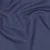 Jeans žakárový úplet v tmavě modré barvě s denim strukturou – látka vhodná na šití oblečení.