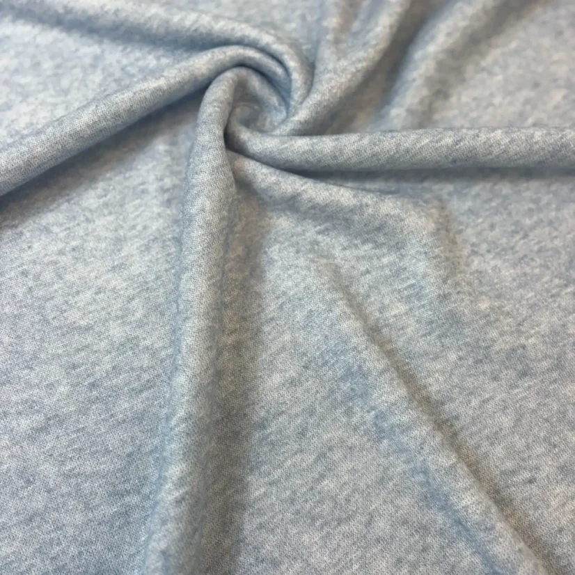 Viskózová svetrovina modrý melír – jemná pletenina s elegantním žíháním pro svetry a kardigany.