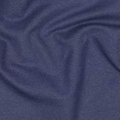 Jeans žakárový úplet v tmavě modré barvě s denim strukturou – látka vhodná na šití oblečení. Jeans žakárový úplet v tmavě modré barvě s denim strukturou – látka vhodná na šití oblečení.